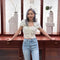 Blusa de Punto Blanco con Cadena de Perlas y Manga Corta
