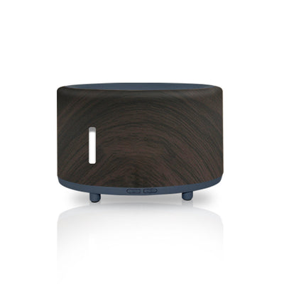 Two-tone cylindrical humidifier with a light body and dark base, featuring control buttons and small feet. - Image 6