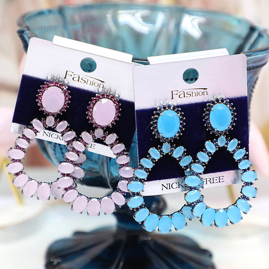 Aretes de Cristal Ovalados con Incrustaciones de Circonio y Diamante