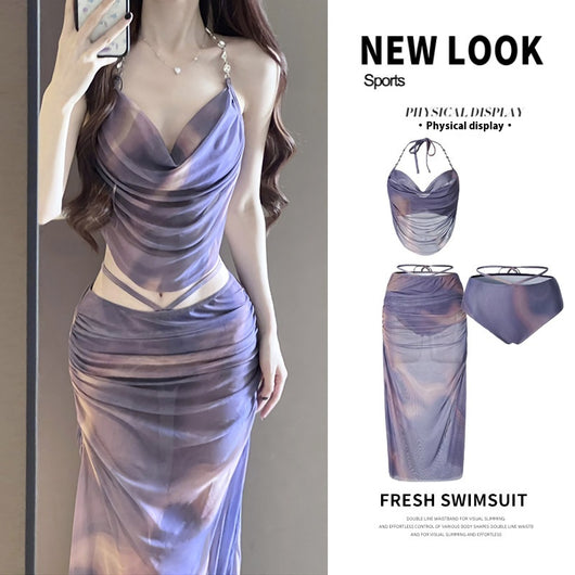 Purple and brown tie-dye two-piece swimsuit with a ruched cowl neck halter top and a matching high-waisted skirt. - Image 7