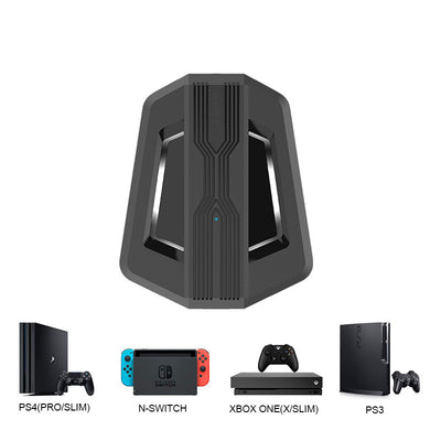 Black keyboard and mouse adapter for gaming consoles with yellow LED accents, next to its product box. - Image 3