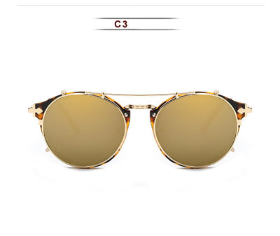 Round frame sunglasses with light blue mirrored lenses and a gold-tone metal frame, featuring a double bridge. - Image 12