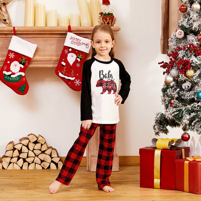 Family of three wearing matching Christmas pajamas with white tops, black raglan sleeves, and red buffalo plaid bear graphics, paired with red and black buffalo - Image 10