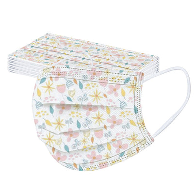 Stack of disposable facial masks with a watercolor floral pattern of red, pink, and orange roses and green leaves. - Image 15