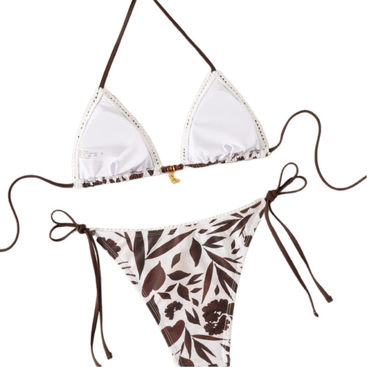 Brown and white floral print triangle bikini with tie-side bottoms and a small gold pendant detail. - Image 5