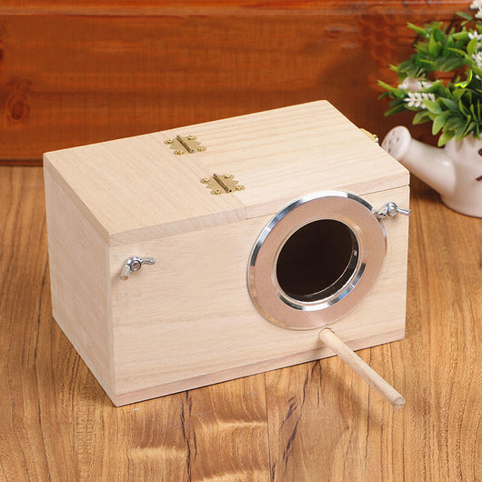 Light-colored wooden birdhouse with a circular silver metal entrance, a wooden perch, and brass-colored hardware. - Image 13