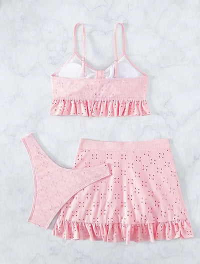 Light blue eyelet two-piece swimsuit set with a tie-front crop top and a matching ruffle-trim hip-hugging skirt. - Image 33