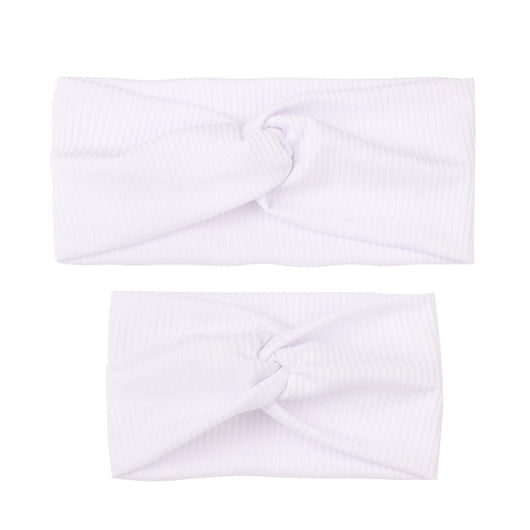 Matching dusty rose ribbed knit headbands with a twisted knot, one for an adult and one for a child. - Image 4