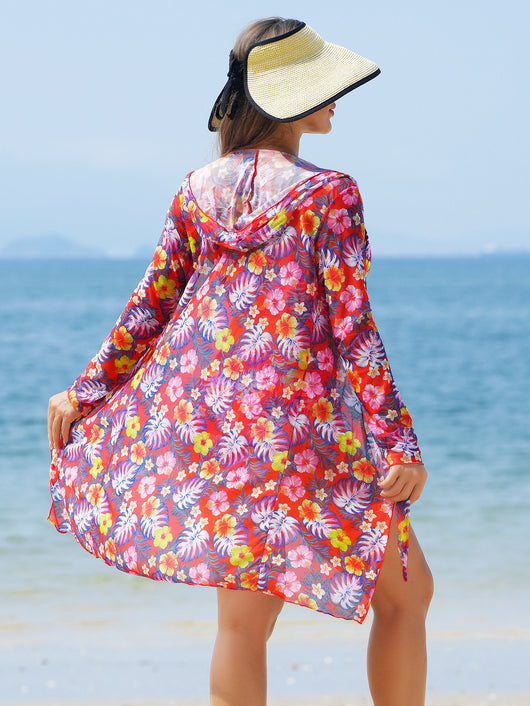 Woman in a red multicolor floral print three-piece swimsuit with high-waisted bikini and long-sleeve cover-up, straw hat, and sunglasses on a beach. - Image 18