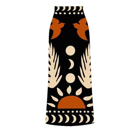 Black one-piece swimsuit with an asymmetrical top and matching long skirt, featuring a tropical palm tree and bird print. - Image 11