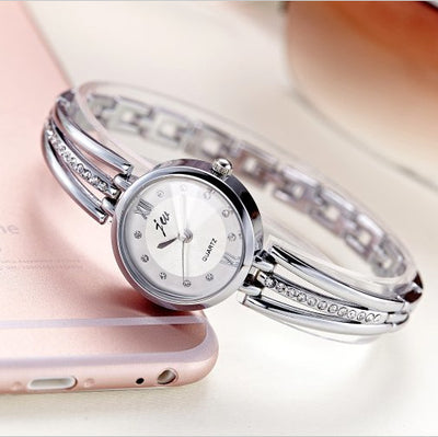 Reloj de Mujer con Esfera Redonda y Banda de Acero Brillante - Image 3