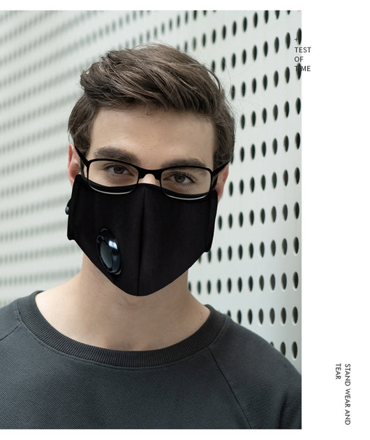 Man wearing a black knitted anti-fog face mask with an exhalation valve, black-rimmed glasses, and a dark grey shirt. - Image 5