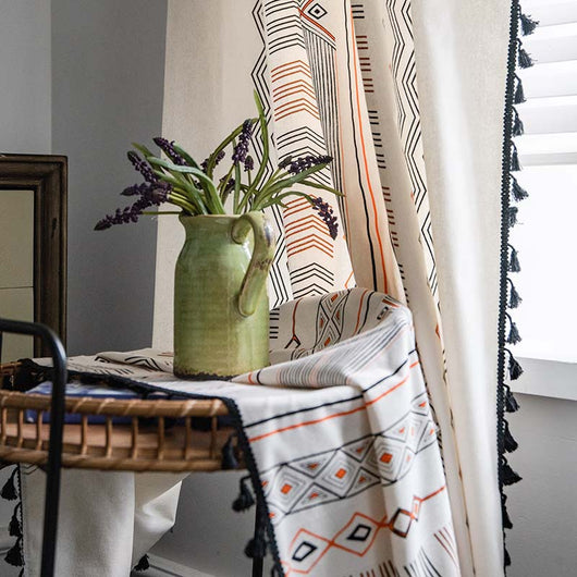 Boho cream cotton and linen curtain with tribal print in black and orange, featuring black fringe tassels. - Image 10