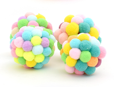 Colorful cat toy ball made of soft, pastel-colored pom-poms, including yellow, pink, purple, green, and blue. - Image 3