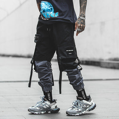 Pantalones deportivos con múltiples bolsillos y cordón ajustable - Image 9