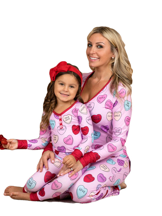 Pink long-sleeve pajama set with a conversation heart print, red Henley neckline, and matching full-length pants. - Image 5