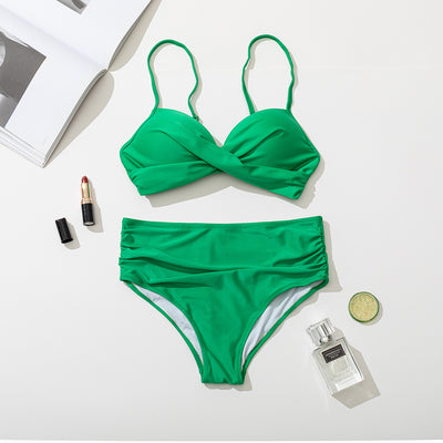 Women's black two-piece bikini with a twisted front bandeau top and high-waisted ruched bottoms. - Image 19