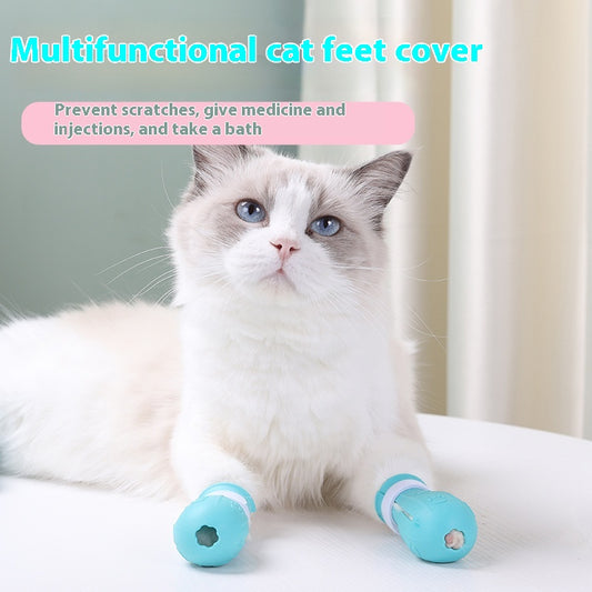 Four teal rubber cat paw covers with white hook-and-loop straps and paw print details, designed for anti-scratch protection.