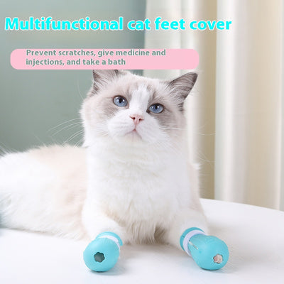 Four teal rubber cat paw covers with white hook-and-loop straps and paw print details, designed for anti-scratch protection.