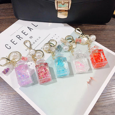 Llavero Perfume Mujer con Efecto Arenilla Dinámica - Image 11
