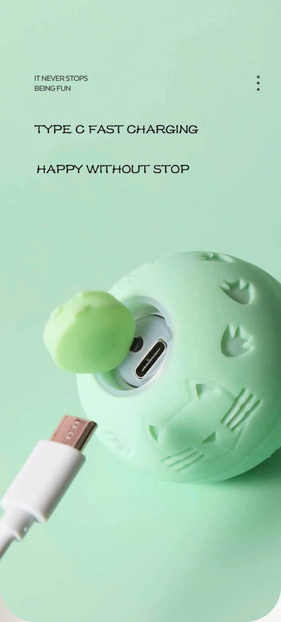 Light green spherical interactive cat toy with cut-out patterns and a central circular feature, measuring 1.89 inches. - Image 7