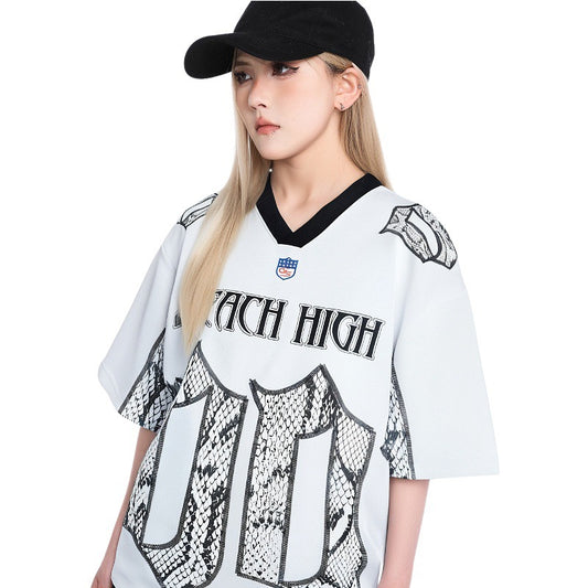 White mesh jersey t-shirt with a V-neck and short drop-shoulder sleeves, featuring a black and white snake scale design.
