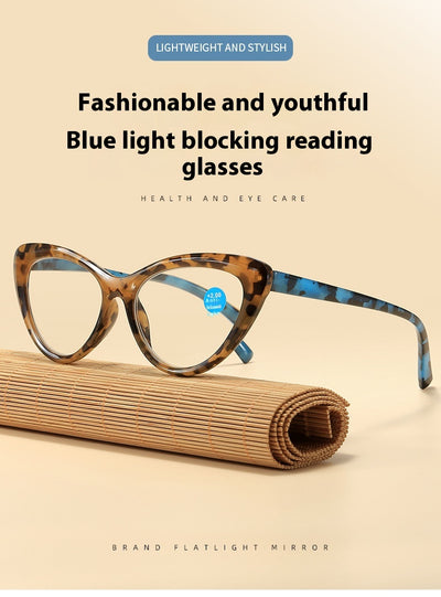 Black cat-eye anti-blue light reading glasses with green patterned temples on a white background. - Image 10
