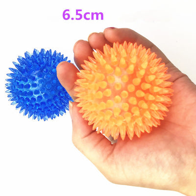 Red spiky TPR ball, a durable and bouncy toy for large dogs, designed for play and massage. - Image 5
