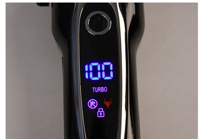 Black and silver hair clipper with an LCD display showing '100' and 'TURBO', featuring a power button and textured blade. - Image 15