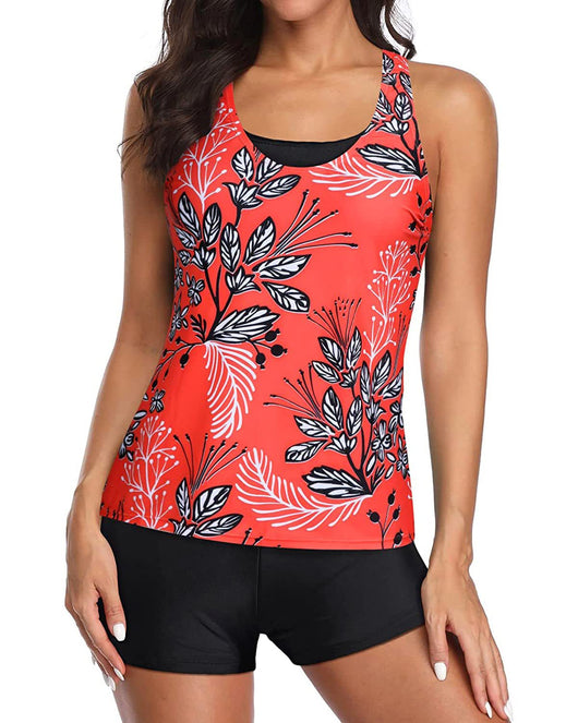 Women's three-piece swimsuit with a black tankini top, colorful geometric patterned bikini top, and matching swim shorts. - Image 45