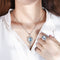 Conjunto de Anillo y Pendiente de Aguamarina Simulada