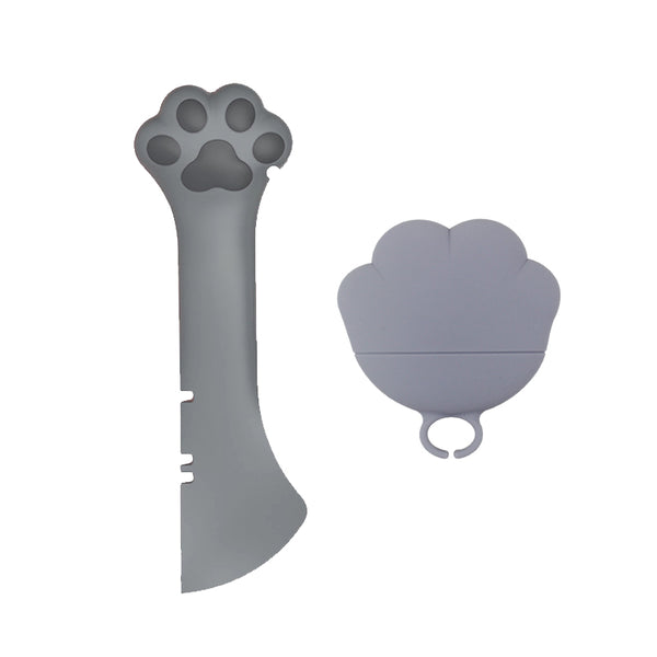 Gray pet food spoon with a paw print handle and a matching paw-shaped can opener lid. - Image 18