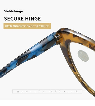 Black cat-eye anti-blue light reading glasses with green patterned temples on a white background. - Image 13