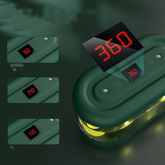 Dark green and clear oval USB humidifier with two mist outlets, shown next to its white product box. - Image 5