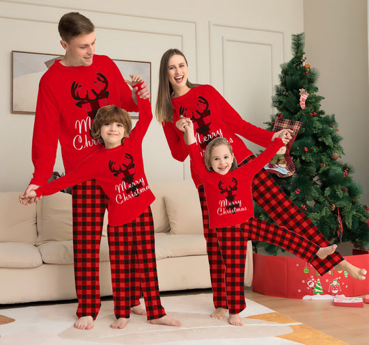 Family of four wearing matching red and black buffalo plaid Christmas pajamas with reindeer and "Merry Christmas" text. - Image 10