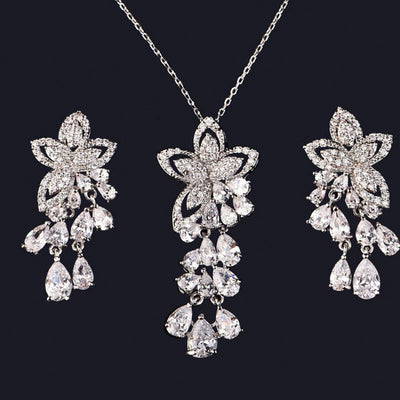 Aretes de Circón Flor Pequeña con Borla de Gota - Hipoalergénicos Estilo Coreano - Image 9