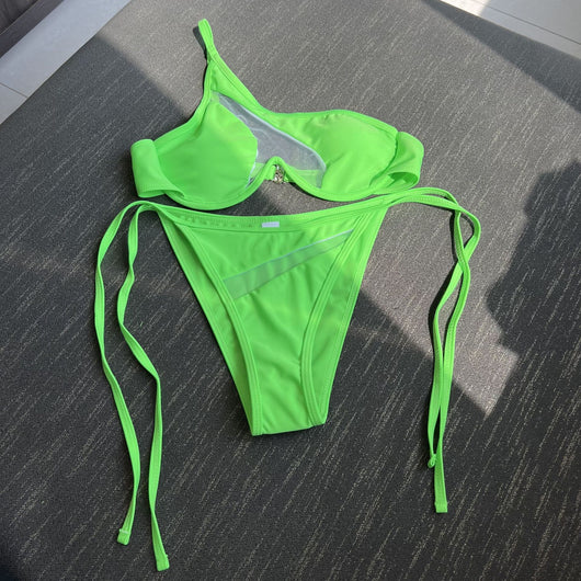 Orange one-shoulder bikini with sheer cutouts and side ties, modeled by a woman against a bright blue sky. - Image 19