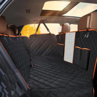 Black quilted Oxford cloth car pet mat installed in a car's rear seat, featuring a hammock design with side flaps. - Image 8