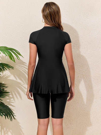Navy blue two-piece conservative swimwear with short-sleeve peplum top and mid-length shorts, featuring a front zipper. - Image 14