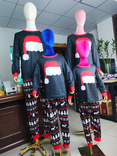 Black long-sleeve Christmas pajama top with a red Santa hat graphic and matching pants with a reindeer and tree pattern. - Image 10