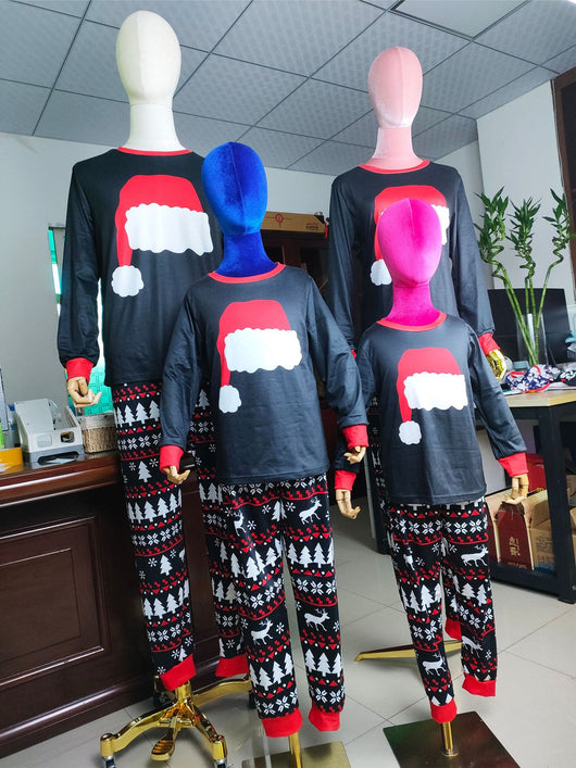 Black long-sleeve Christmas pajama top with a red Santa hat graphic and matching pants with a reindeer and tree pattern. - Image 10