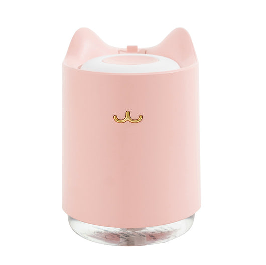 White mini USB humidifier with cat ears and a gold cat nose/mouth emblem, featuring a clear water tank base. - Image 11