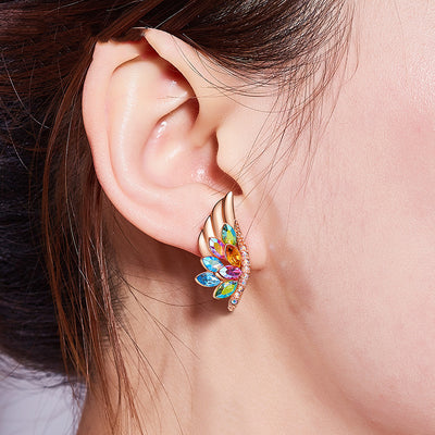 Aretes de Ala Minimalista - Diseño Versátil y Elegante