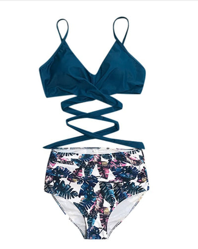 Teal wrap-around bikini top with high-waisted bottoms featuring a vibrant tropical leaf print in blue, pink, and purple. - Image 12