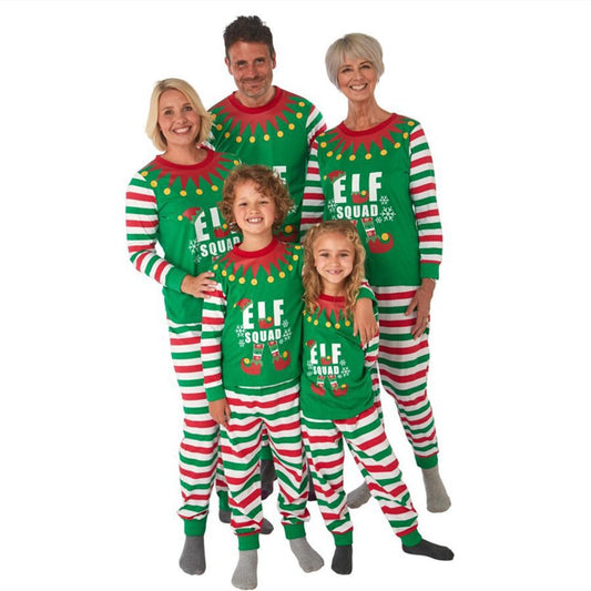 Family of four wearing matching green and red striped Christmas pajamas with "ELF SQUAD" and elf boot graphics.