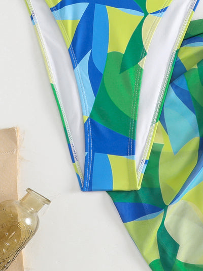 Sexy lace-up backless beach swimwear skirt set with a vibrant blue, green, and yellow geometric print. - Image 7