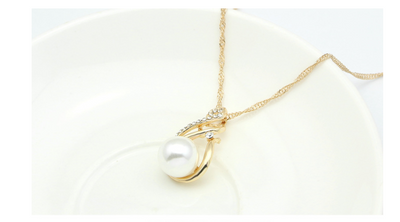 Gold-tone necklace and matching earrings set with white faux pearls and clear rhinestones, ideal for bridal or dinner wear. - Image 14
