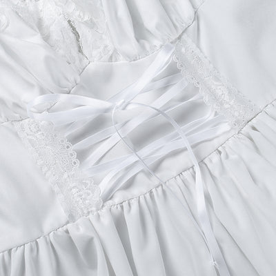 Vestido Blanco con Panel de Encaje y Cintura Anudada - Image 17