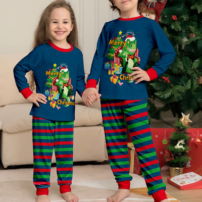 Child's blue long-sleeve Christmas pajamas with a dinosaur graphic and red and green striped pants.