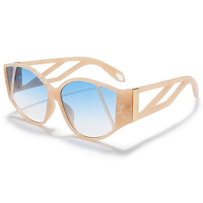 Light peach cat-eye sunglasses with purple gradient lenses and geometric cutouts on the frame. - Image 8